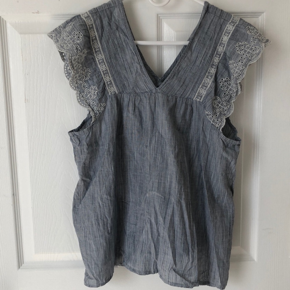 Light blue sleeveless blouse